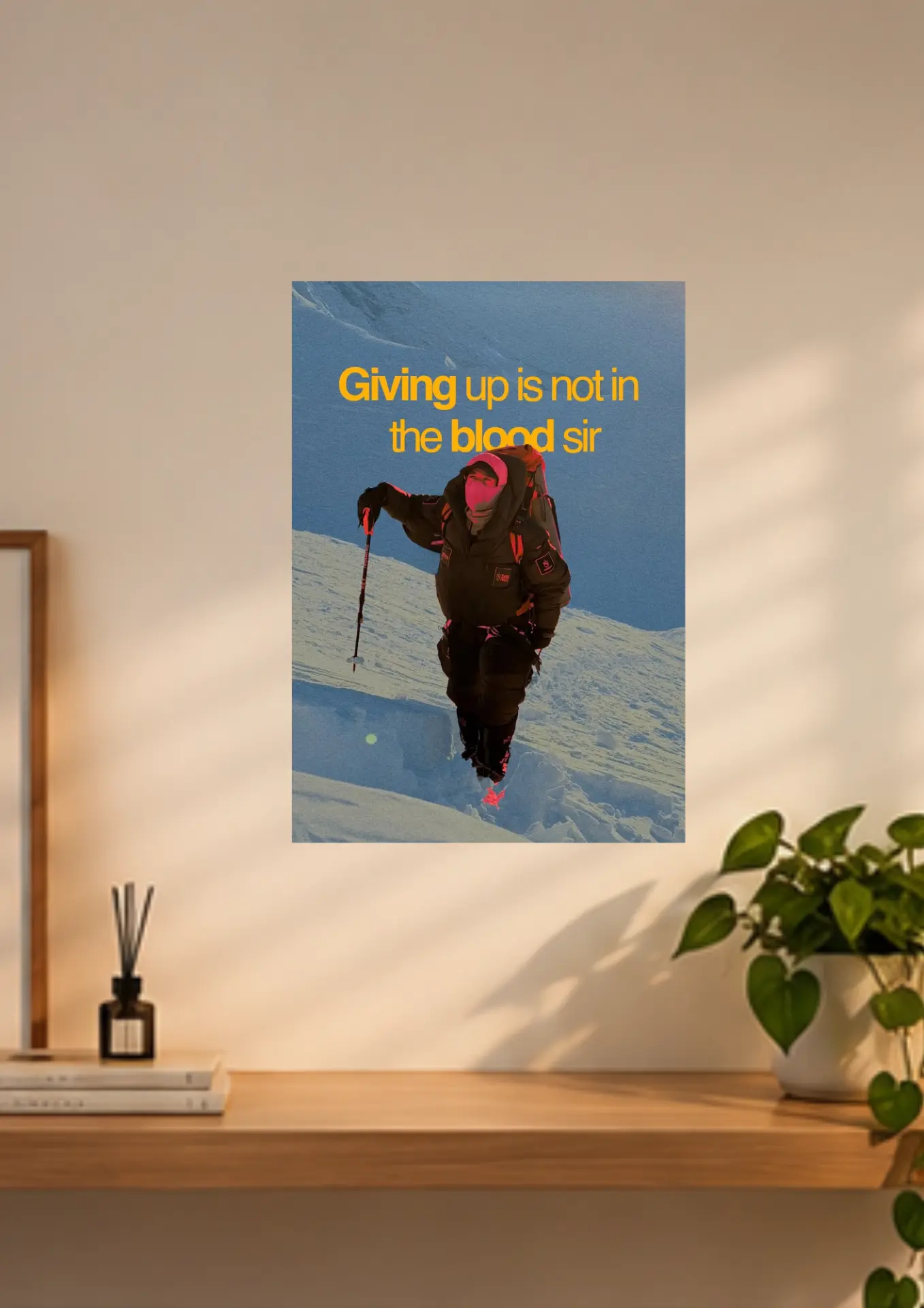 Giving Up Is Not In The Blood – Climber on a wall